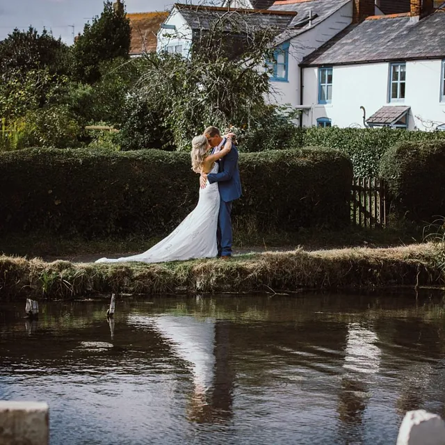 Bride and groom at lake